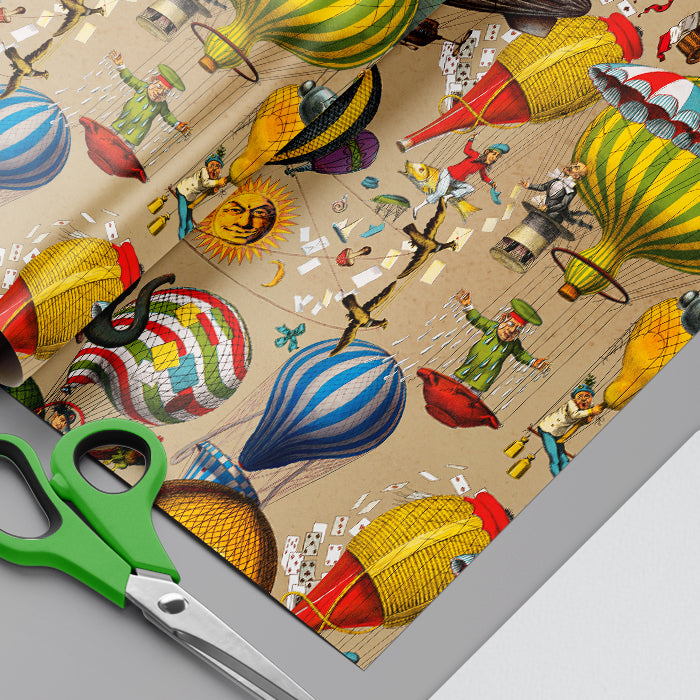 Colorful hot air balloon Wrapping Paper with scissors on a wooden surface