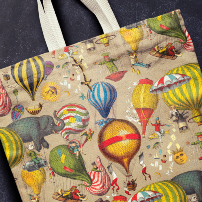 Tote bag with vintage-style hot air balloon and circus-themed design.