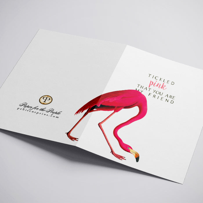 Greeting card with a pink flamingo illustration and text on a white background