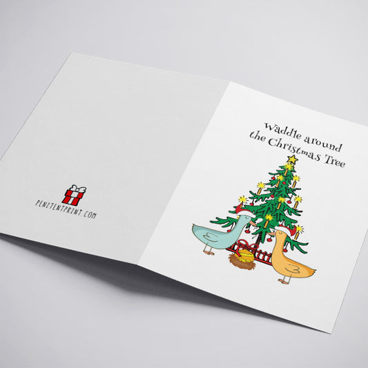 Christmas card with ducks around a decorated tree on a white background