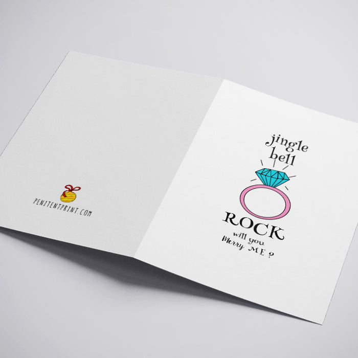 Open card with a ring illustration and text on a white background