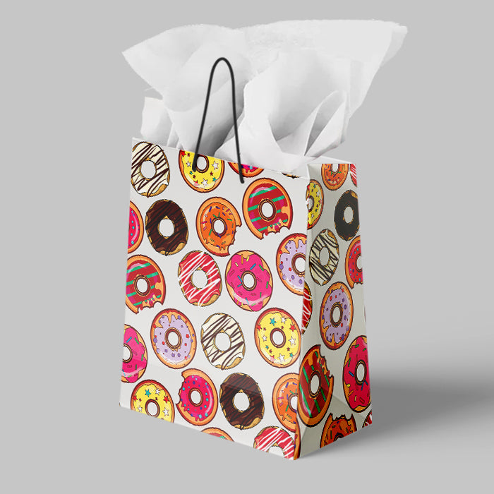 Gift bag with colorful donut pattern on a gray background