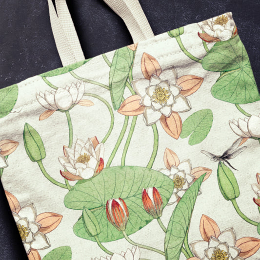 Tote bag with floral design featuring water lilies and leaves.