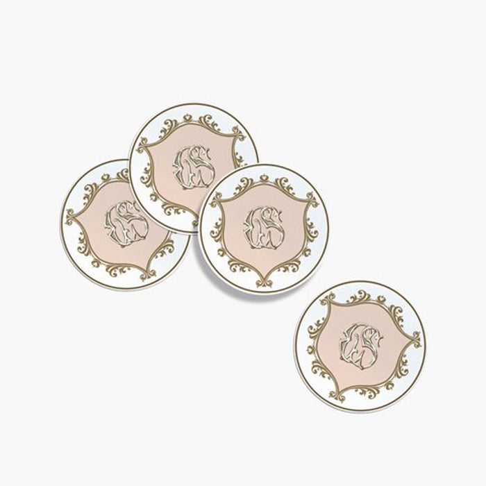 Set of four decorative stickers with central emblem on a white background