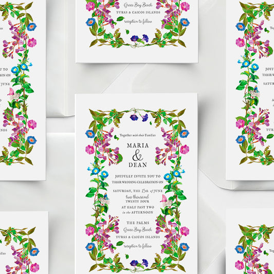 Floral wedding invitation with greenery and colorful flowers on a white background