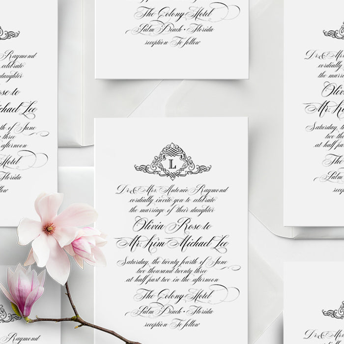 Elegant wedding invitation with floral design on a white background