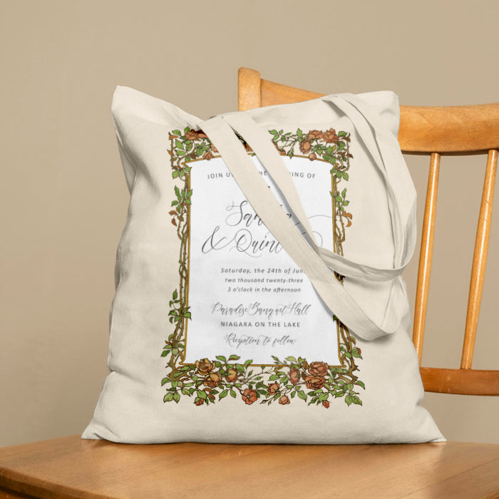 Tote bag with wedding invitation design on a wooden chair