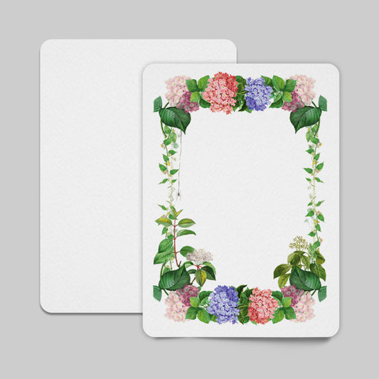 Floral wreath design on a white card with a gray background