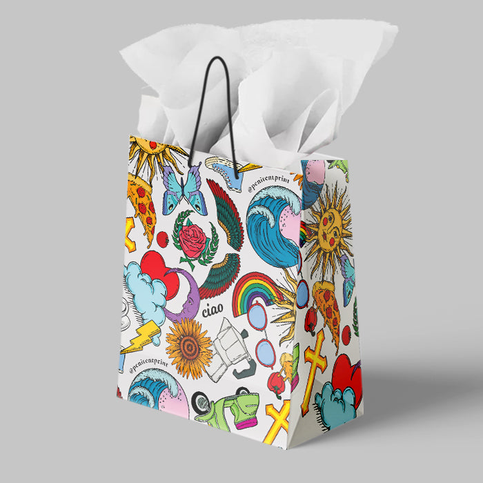 Colorful gift bag with various designs on a gray background