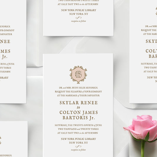 Wedding invitation card with a pink rose on a white background